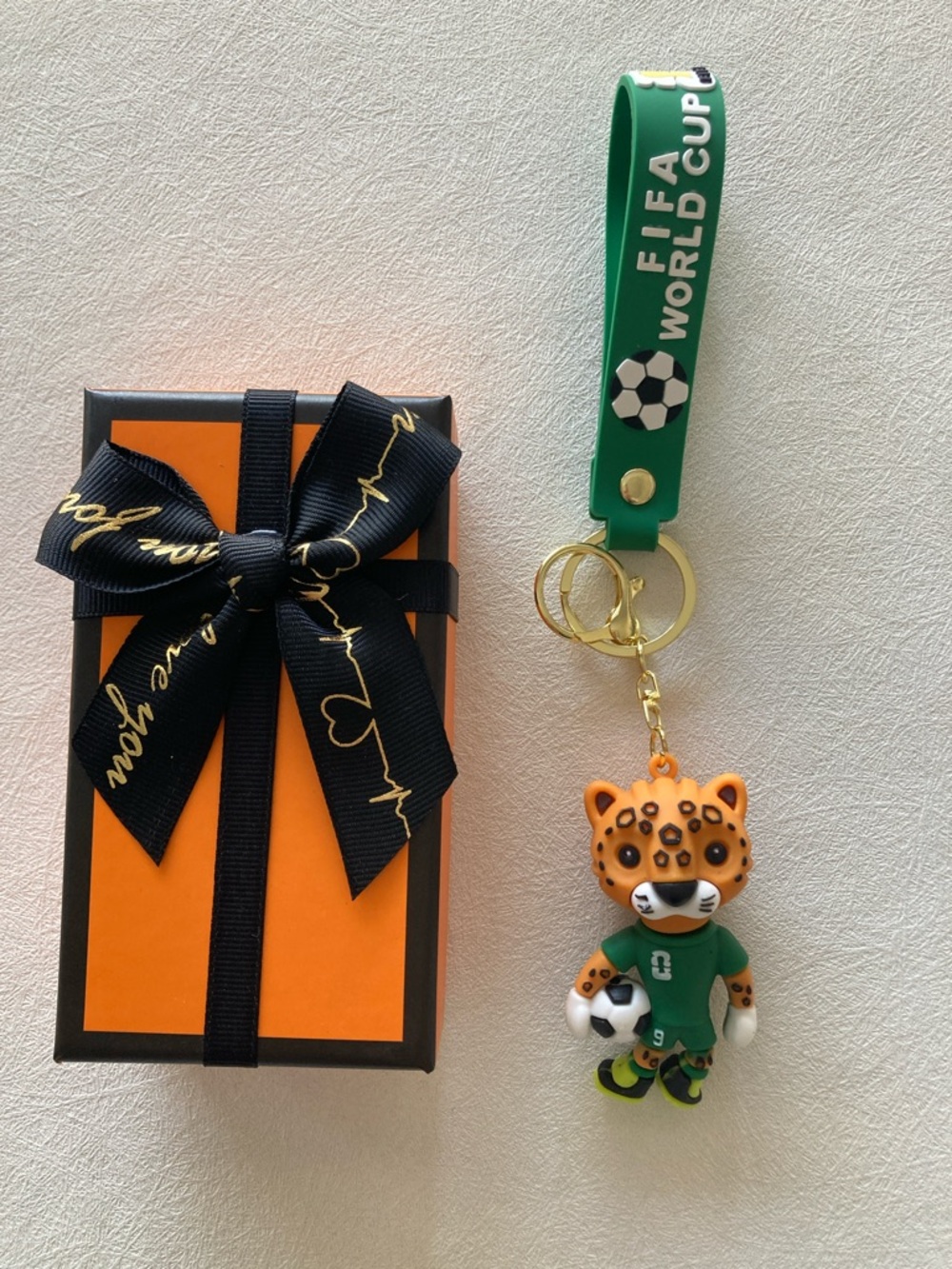 & Other Stories Green Strap Leopard Soccer Keychain